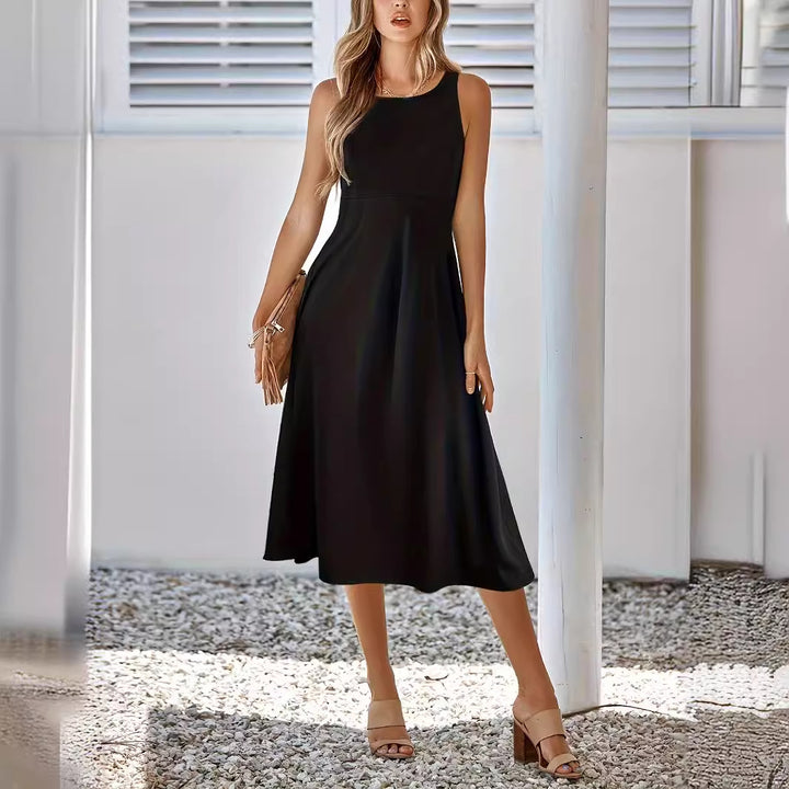 Dame Elegant Midikjole med svajende nederdel og ærmeløs design Stilla