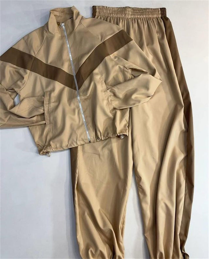Kvinders sporty vindjakke med elastiske manchetter og reflekterende detaljer Skovae