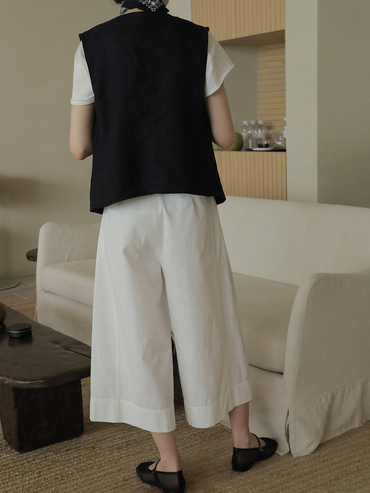 Dame linned vest i minimalistisk design med praktiske knapdetaljer og afslappet pasform Stilla