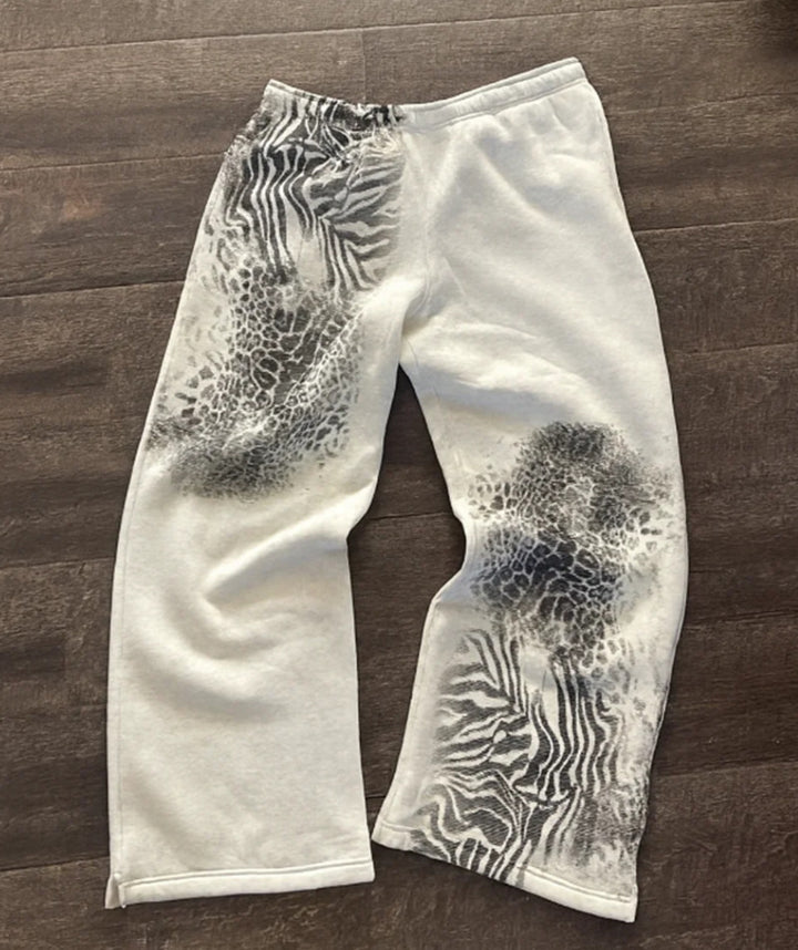Dame nan løse sweatpants med asymmetrisk dyreprint, elastisk komfortlinning og lige ben Skovae
