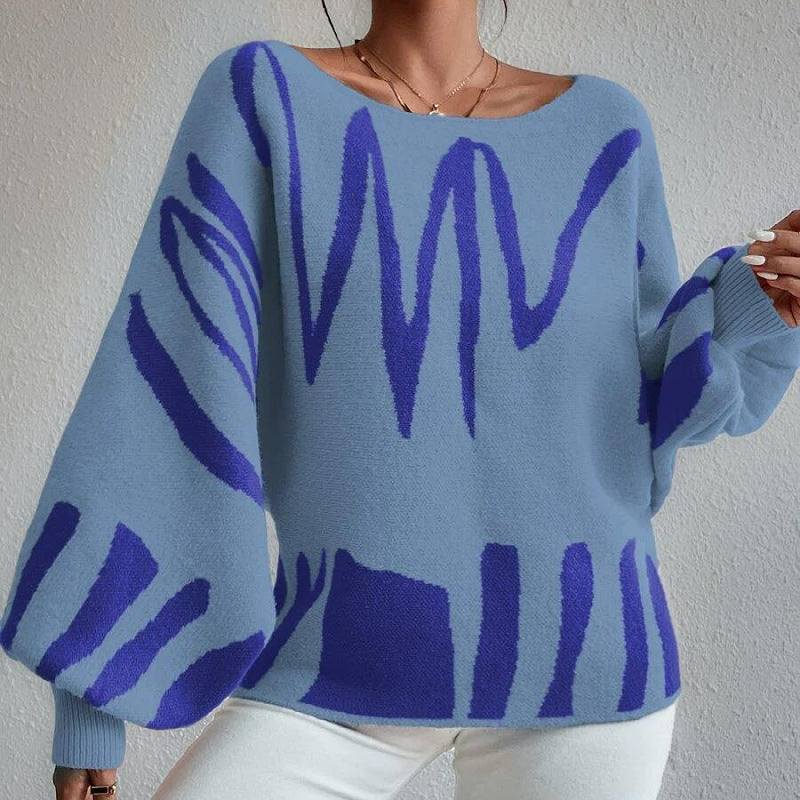 Kvinders oversized striktrøje med asymmetrisk design og afslappet halsudskæring Stilla