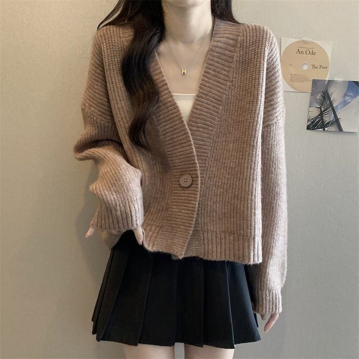 Kvinders løse cardigan med V-hals og store knapper Stilla