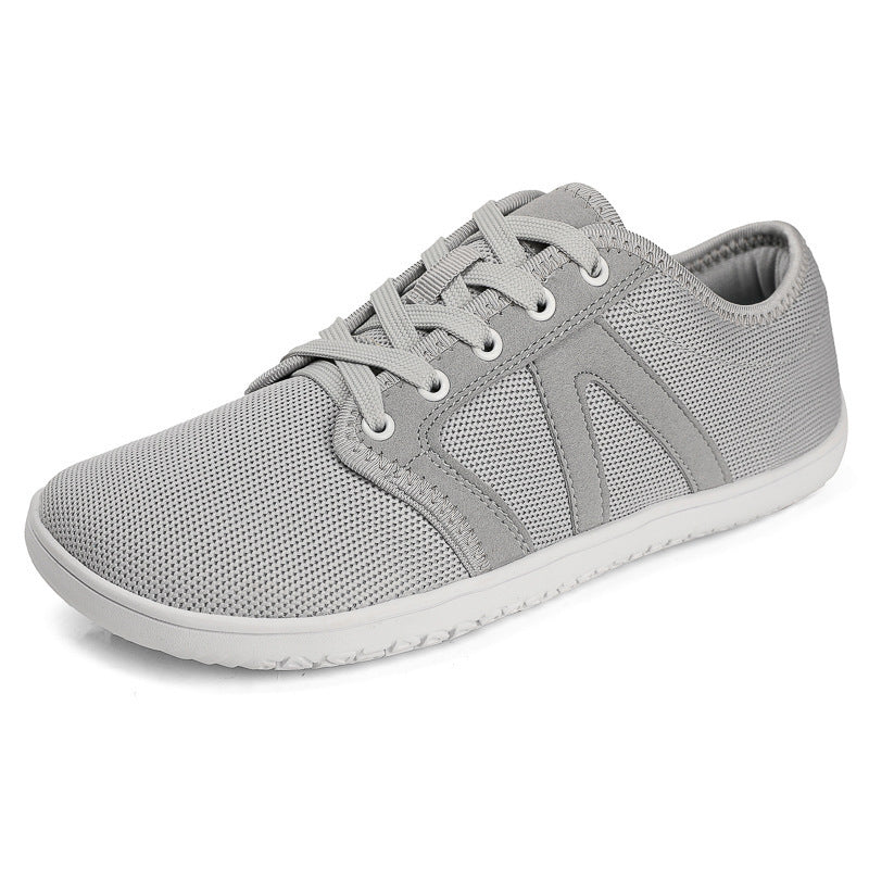 Unisex nan minimalistiske City sneakers med fint masket tekstiloverdel, polstret indgang og fleksibel gummisål Skovae
