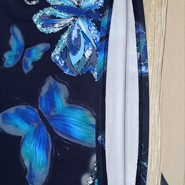 Dame maxikjole med skinnende sommerfugldesign og praktiske lommer Stilla