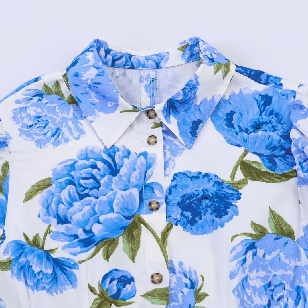 Damebluse med blomstermønster og elegante pufærmer Skovae