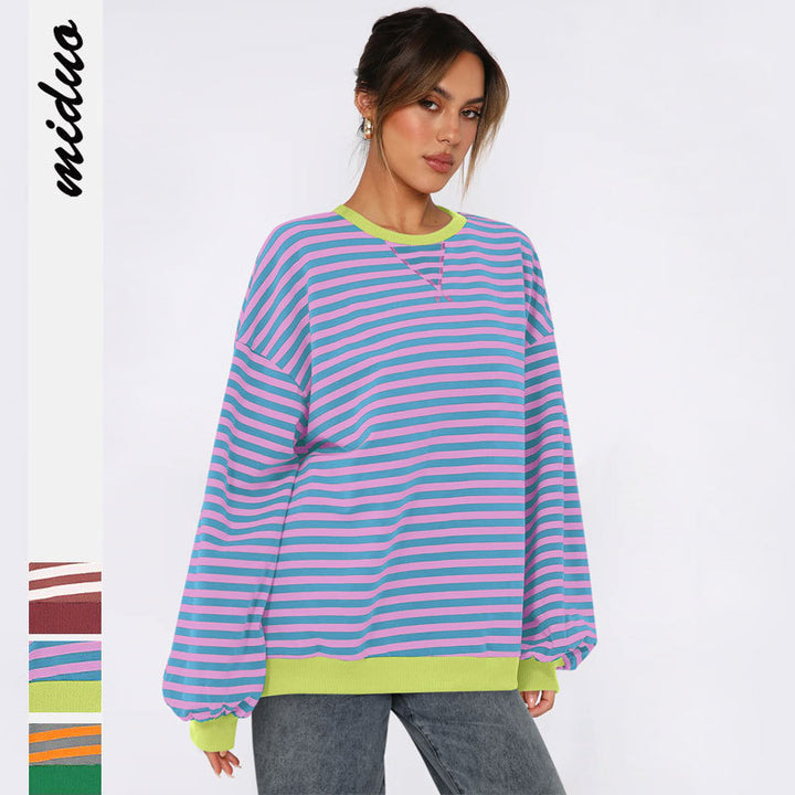 Dame Oversized Sweatshirt med stribet design og komfortable pufærmer Stilla