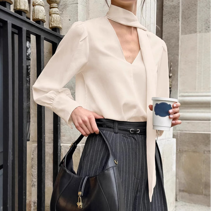 Dame elegant bluse med asymmetrisk binde detalje og voluminøse ærmer Stilla