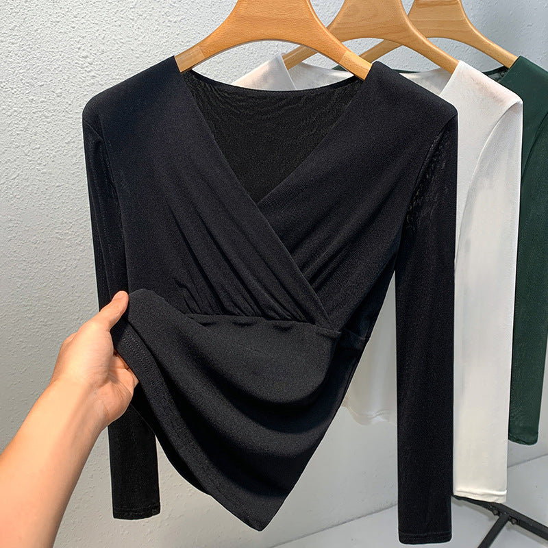 Dame elegant indpakningsbluse lavet af flydende materiale med raffinerede draperingsdetaljer Stilla