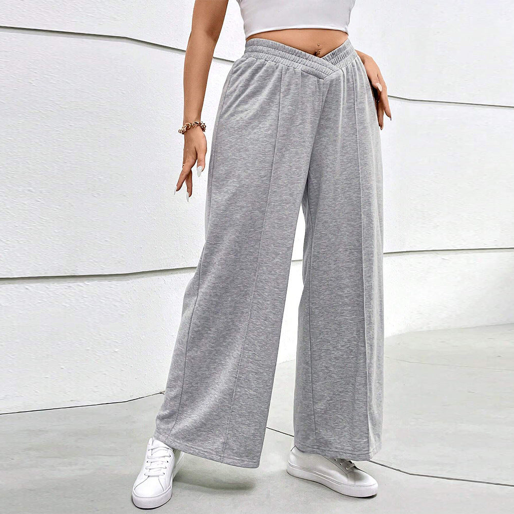 Dame løs siddende fritidshose med elastisk talje og crossover-design Skovae