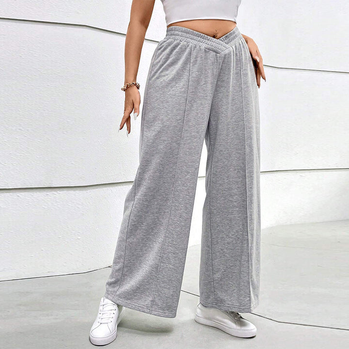 Dame løs siddende fritidshose med elastisk talje og crossover-design Skovae