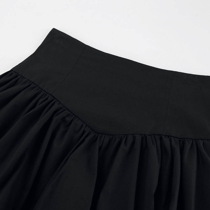Dame Puffærmer Kjole med svajende Skørt og raffineret Knudedesign Stilla