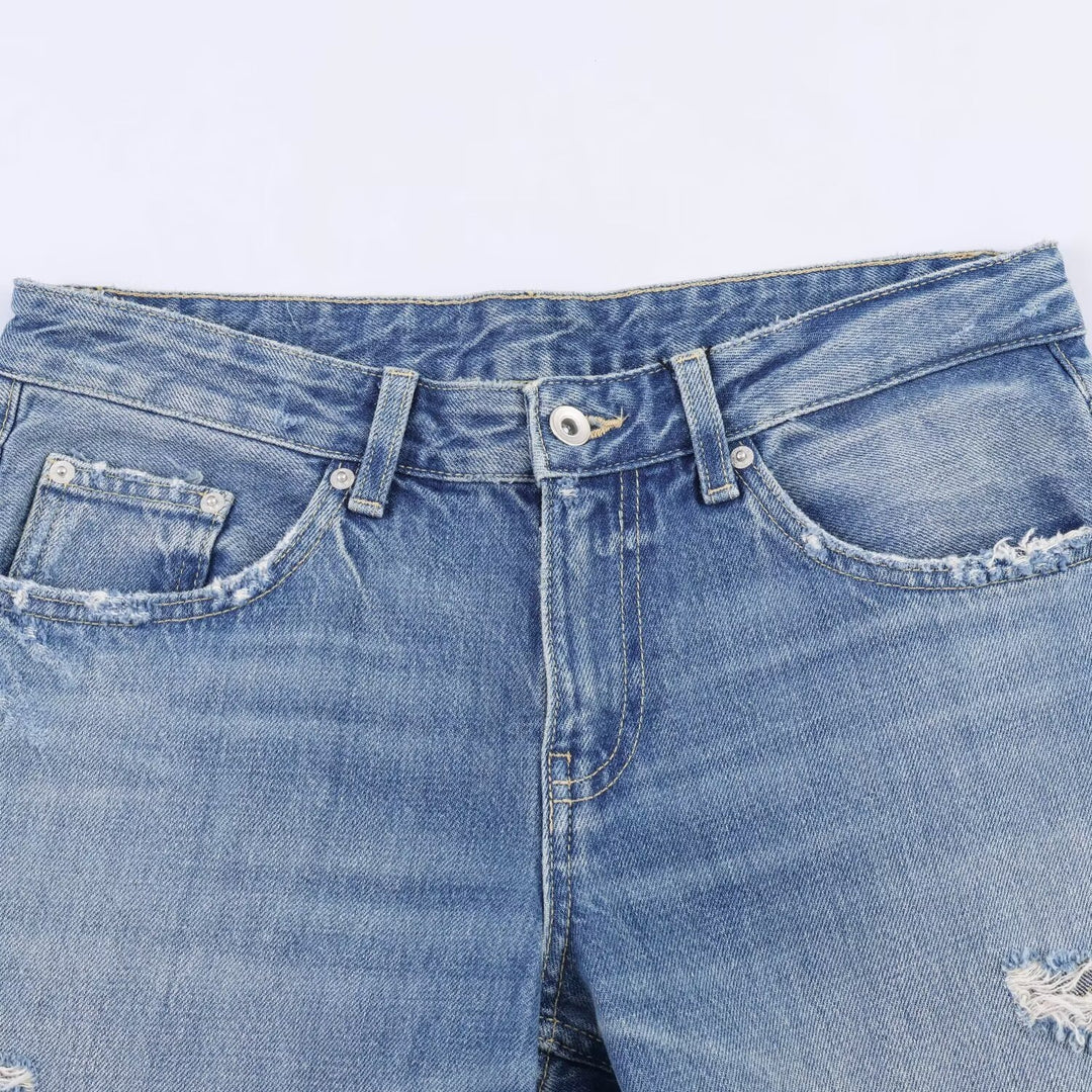Dame Flared Jeans med Destroyed-effekter og frynseafslutninger Skovae