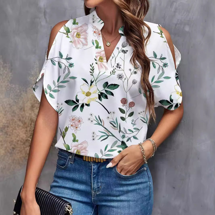 Damebluse med kold skulder og blomstertryk Stilla