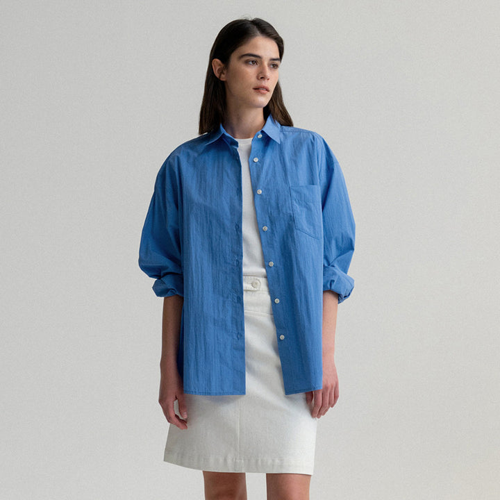 Dame oversized bomuldsbluse med afslappet snit og brystlomme Stilla