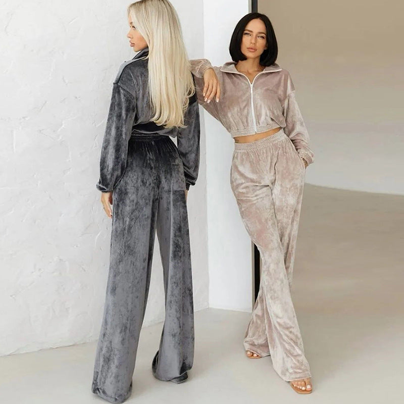 Kvinders fashionable velour sportsdragt med halv lynlås og elastiske manchetter Skovae