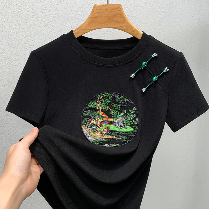 Dame T-shirt med kunstnerisk broderedesign og dekorative applikationer Stilla