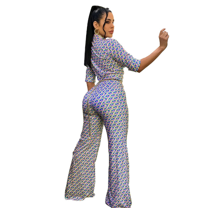 Dame jumpsuit med geometrisk design og smart taljebælte Stilla
