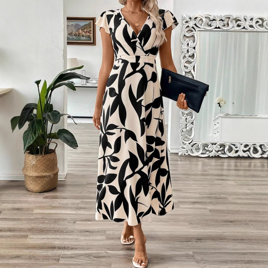 Dame Maxikjole med raffineret indpakningsdesign og floraltryk Stilla