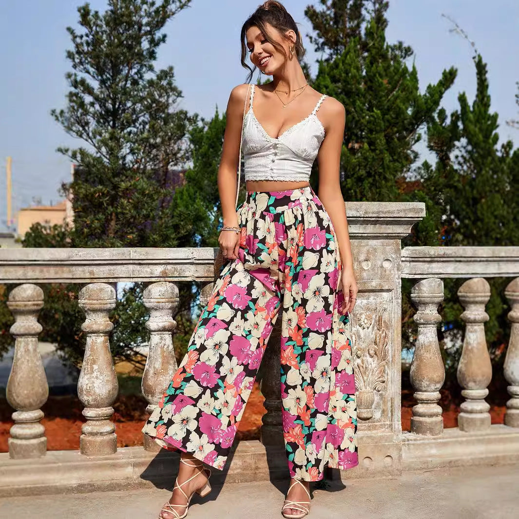 Dame luftig palazzo bukser med farverigt blomstermønster og elastisk talje Stilla