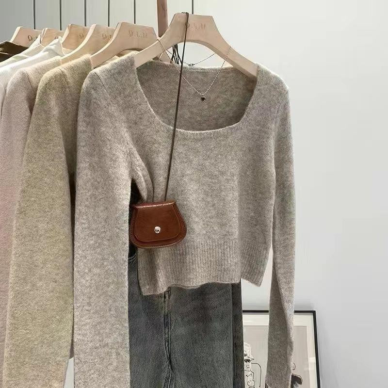 Kvinders fashionable sweater med bred rund halsudskæring og fin tekstur Stilla