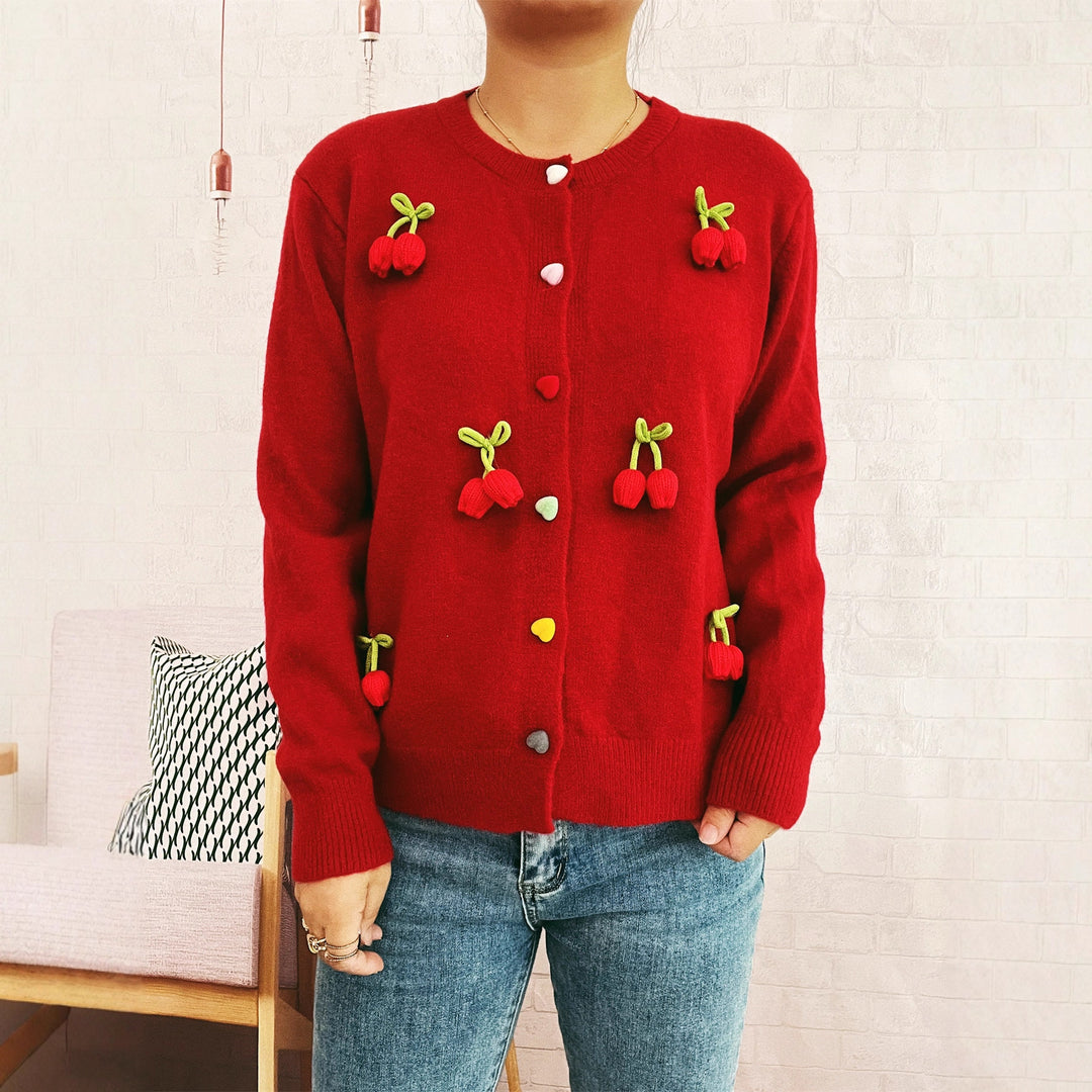 Kvinders cardigan med blomsterdesign og farverige knapdetaljer Stilla