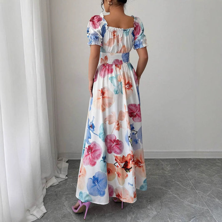 Dame Maxikjole med blomsterprint puffærmer og elastisk taljeområde Stilla