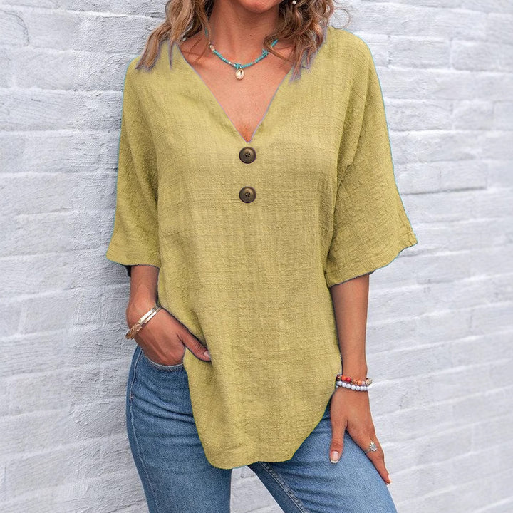 Dame V-hals bluse med knapdetaljer Skovae