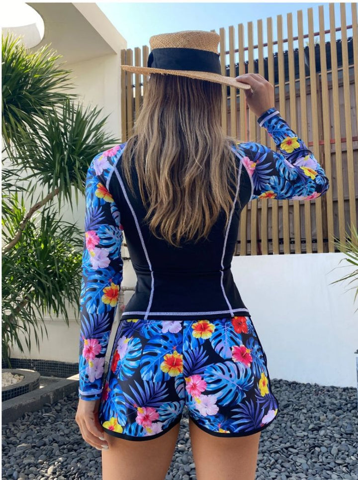 Dame Langærmet Badedragt med sporty design og farverigt blomsterprint Stilla