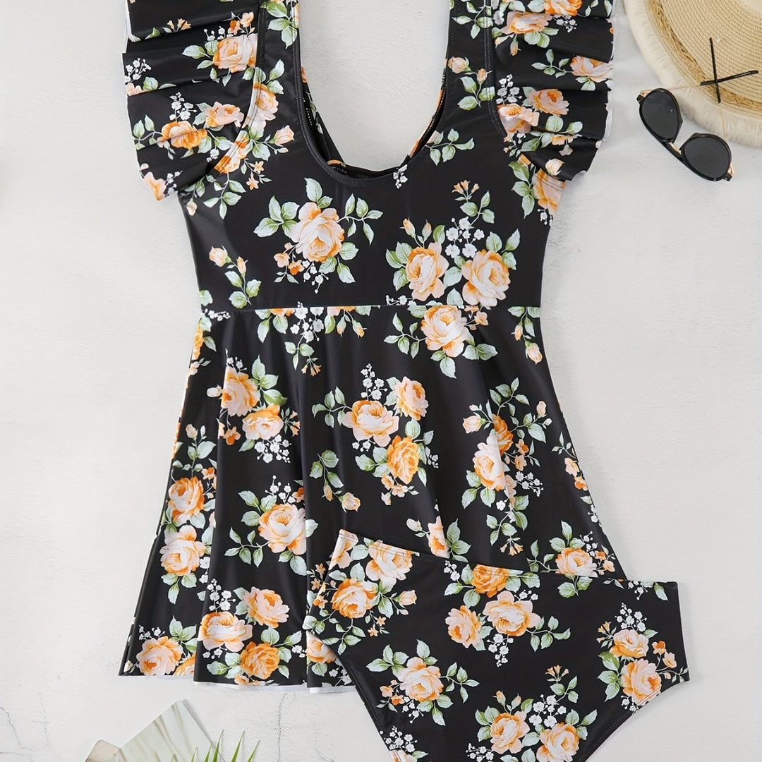 Dame én-delt badedragt med ruffledetails og blomstret design Skovae