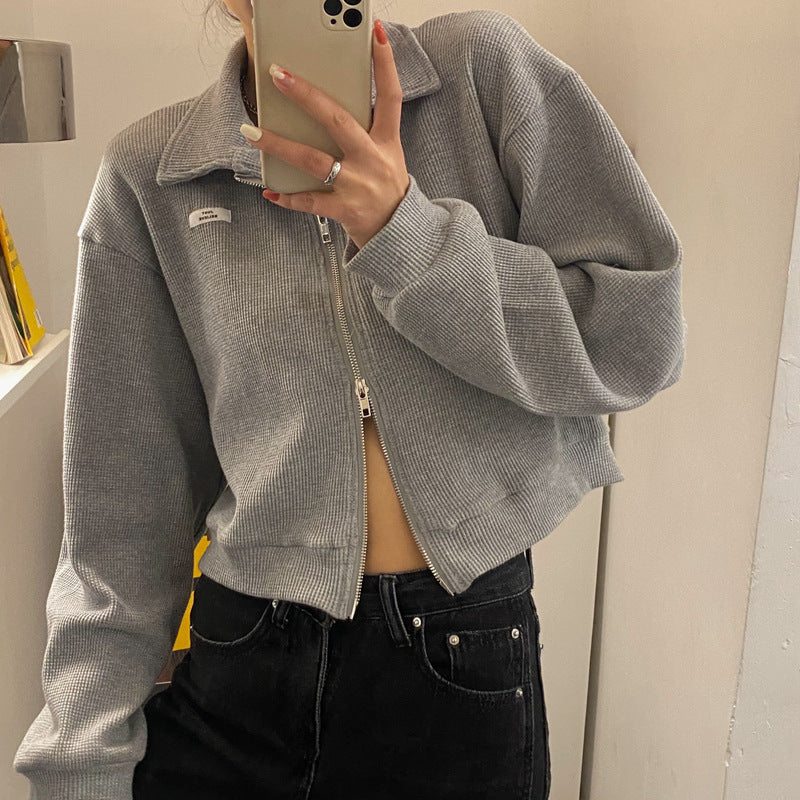 Dame cropped fleece jakke med moderne lynlås og afslappede ærmer