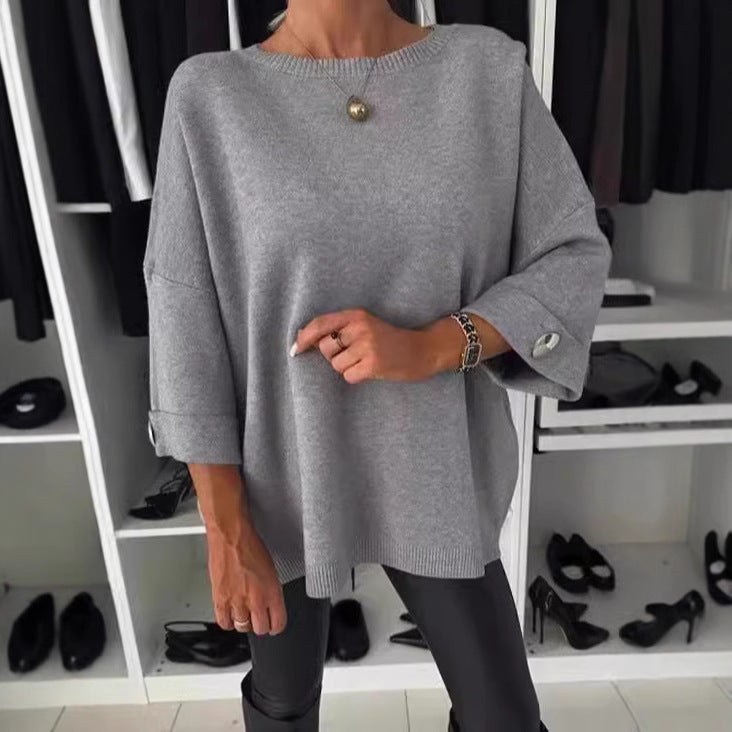 Dame elegant top med dekorative knapper og generøs pasform Stiila