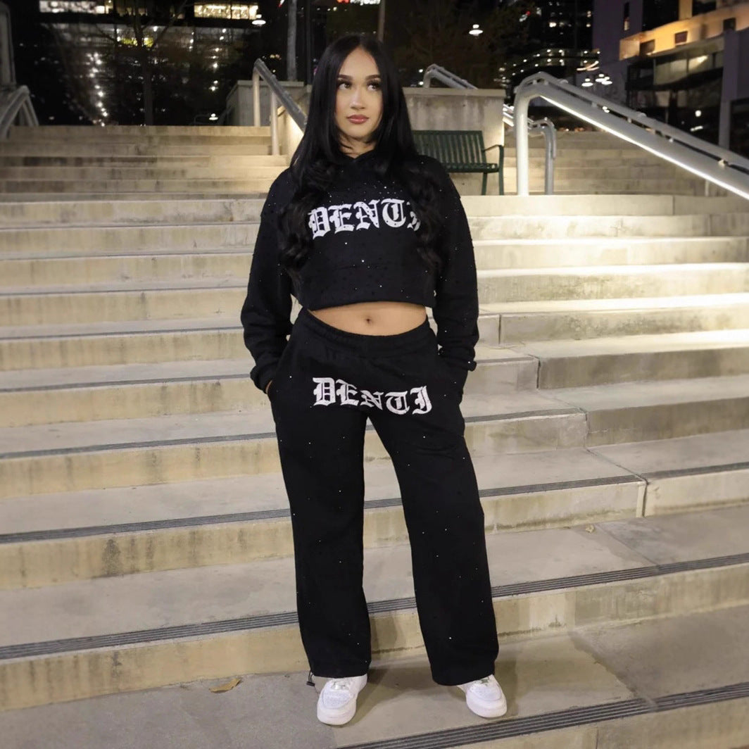 Dame nan vidde sweatbukser med stjernerallover, gothic-logoprint, elastisk talje og stiklommer Skovae
