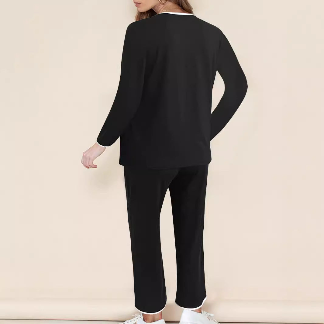 Dame fritids-loungewear-sæt med elegant V-udskæring og bredt ben Stilla