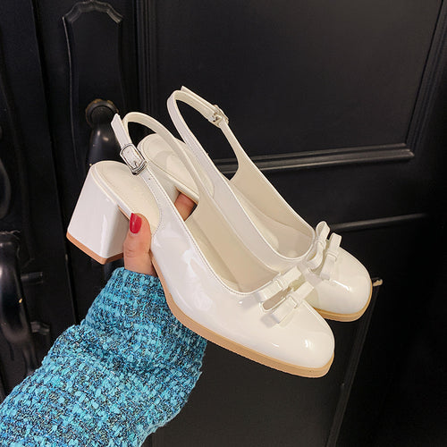 Dame Sling-pumps med elegant sløjfedekoration og komfortabel blokhæle Stilla