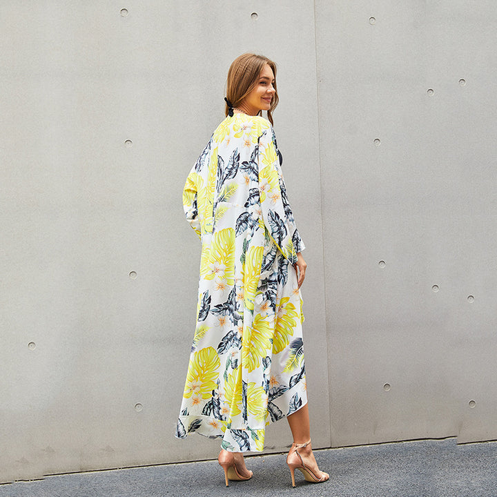 Dame Strandkimono med livligt blomstermønster og bred pasform Stilla