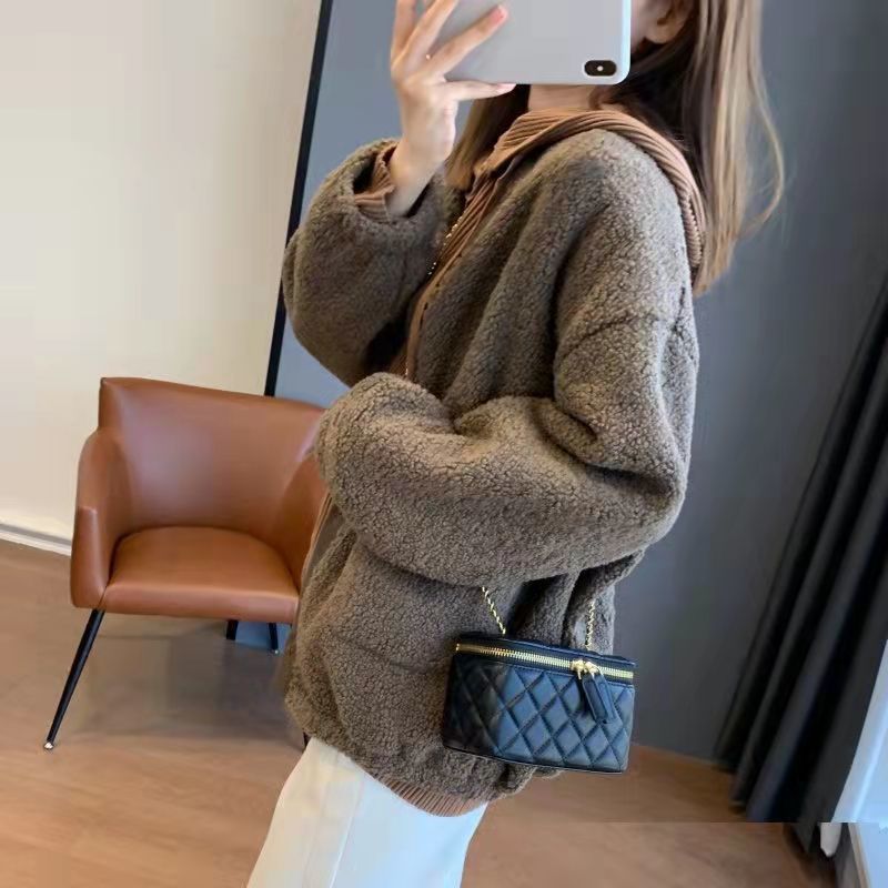 Kvindernes fluffy oversized jakke med store lommer