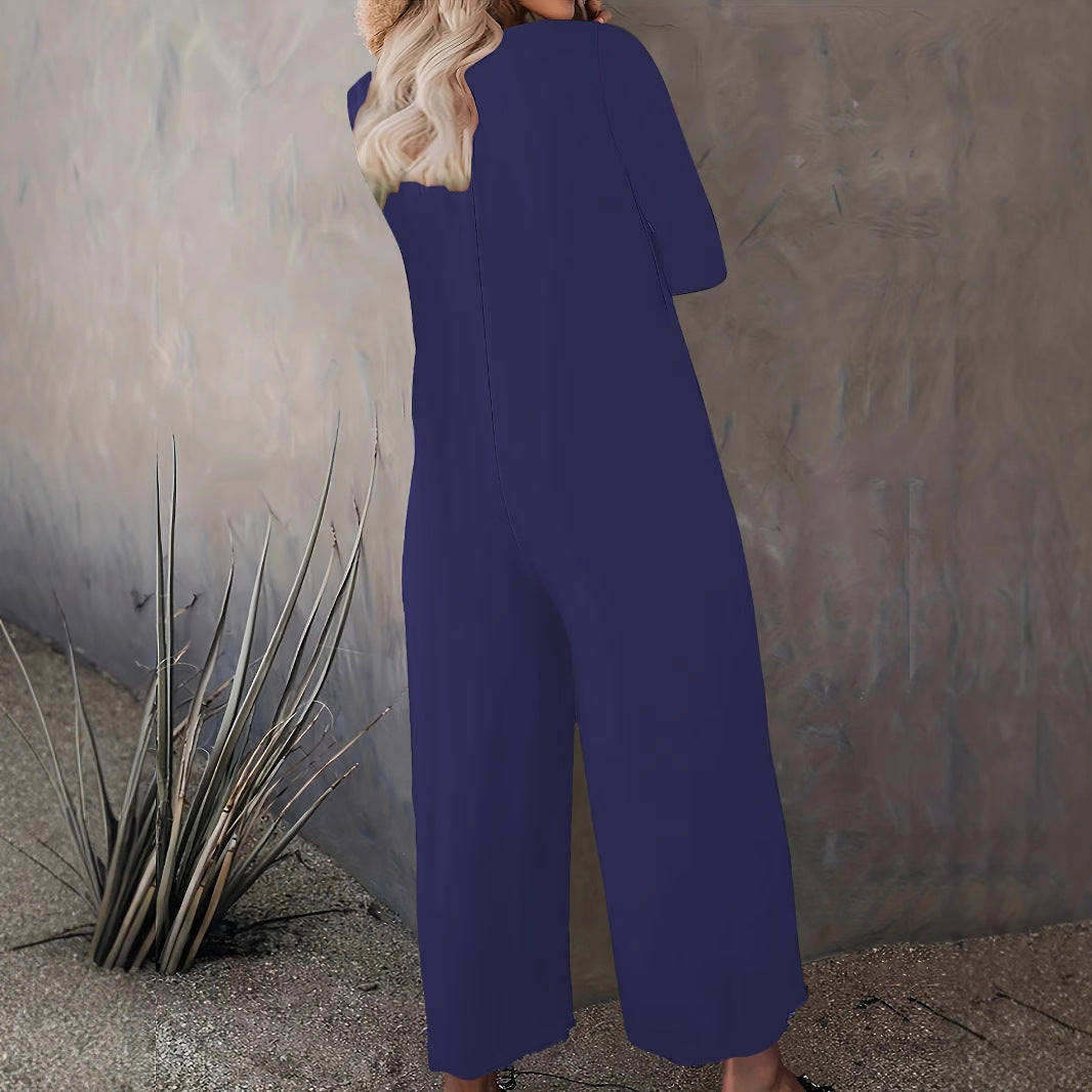 Kvinders bredskårede jumpsuit med praktiske lommer og moderne snit Stilla