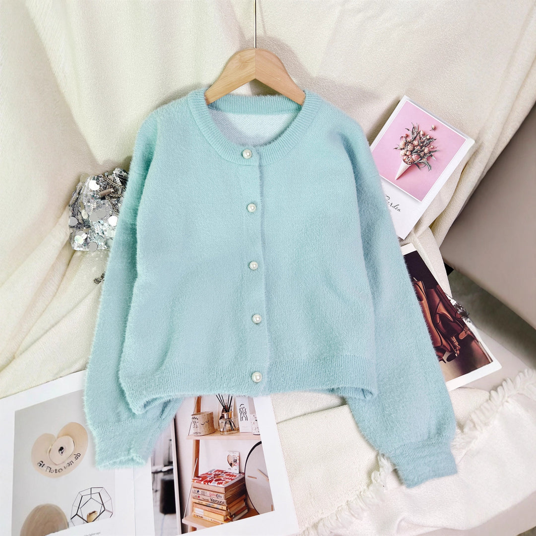 Kvindernes hyggelige cardigan med perlebesatte knapper og moderne snit Stilla