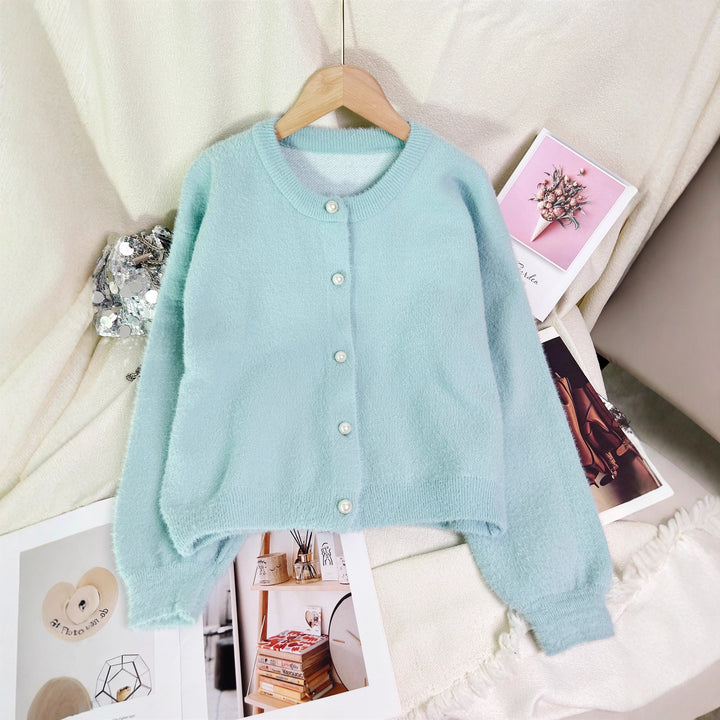 Kvindernes hyggelige cardigan med perlebesatte knapper og moderne snit Stilla