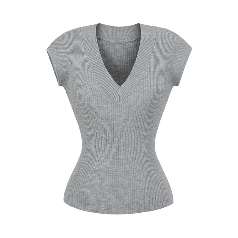 Dame figursyet V-hals top i elastisk materiale Stilla