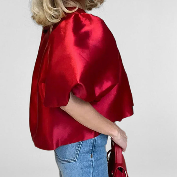 Damebluse med voluminøse puffærmer og moderne design Skovae