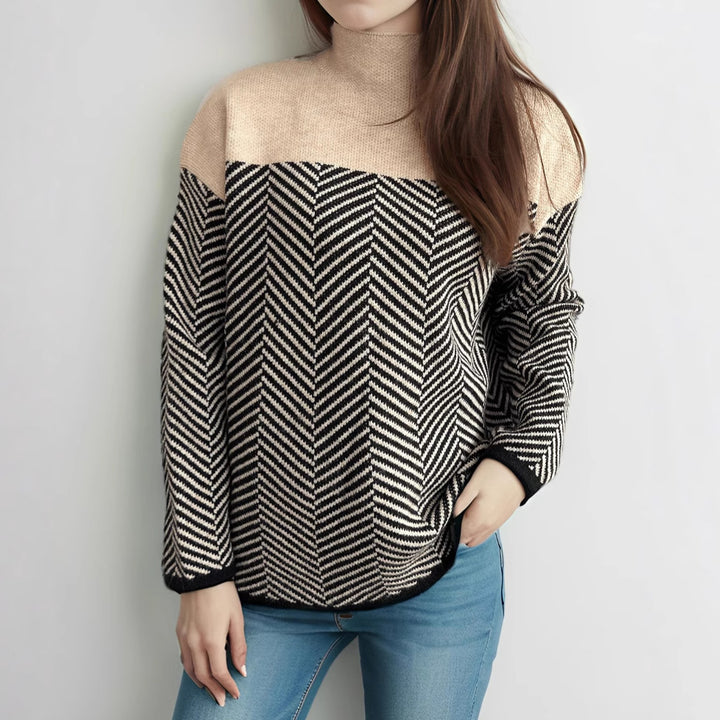 Kvinders hyggelige rullekrave sweater med moderne herringbone mønster og elastiske manchetter Stilla