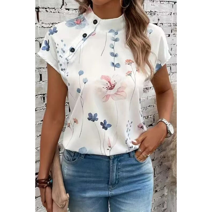 Damebluse med floraltryk og knapdetalje med korte ærmer Stilla