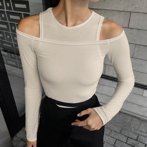 Dame langærmet top med off-shoulder design og trendy snit Stilla