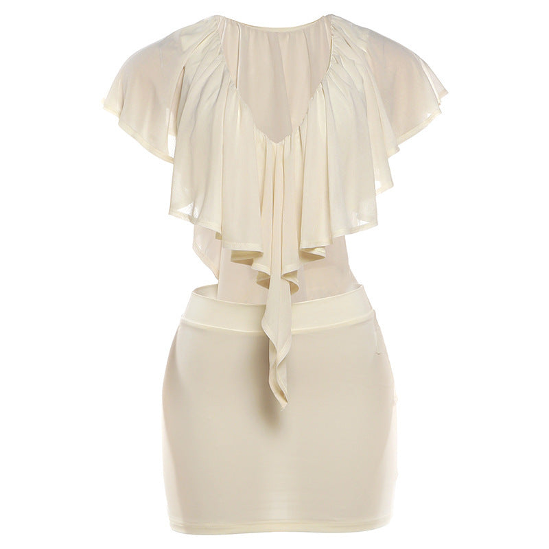 Dame elegant bluse med voluminøse flæsedetaljer og stilig rygudskæring Skovae