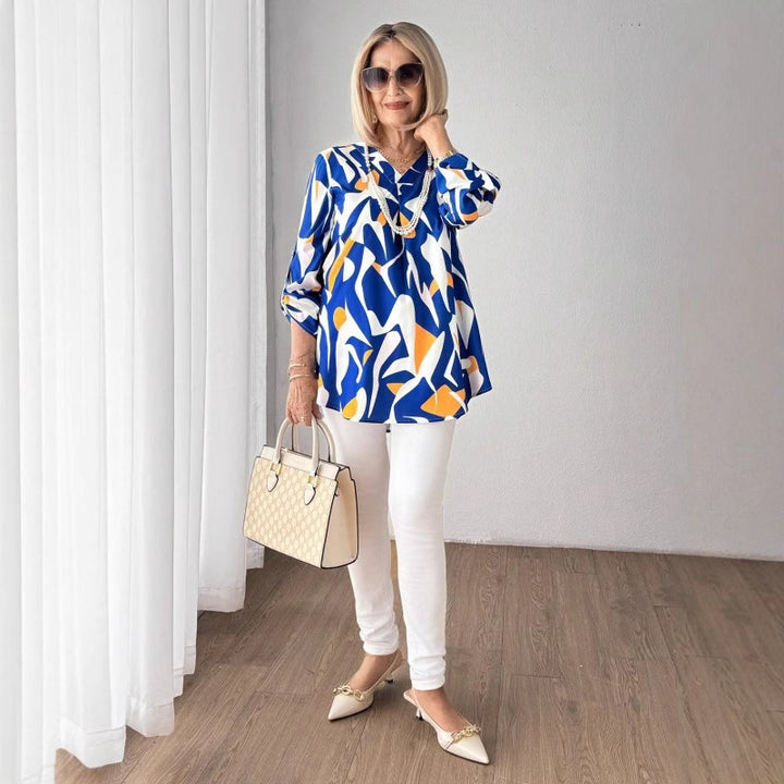 Damebluse med iøjnefaldende grafikdesign Stilla