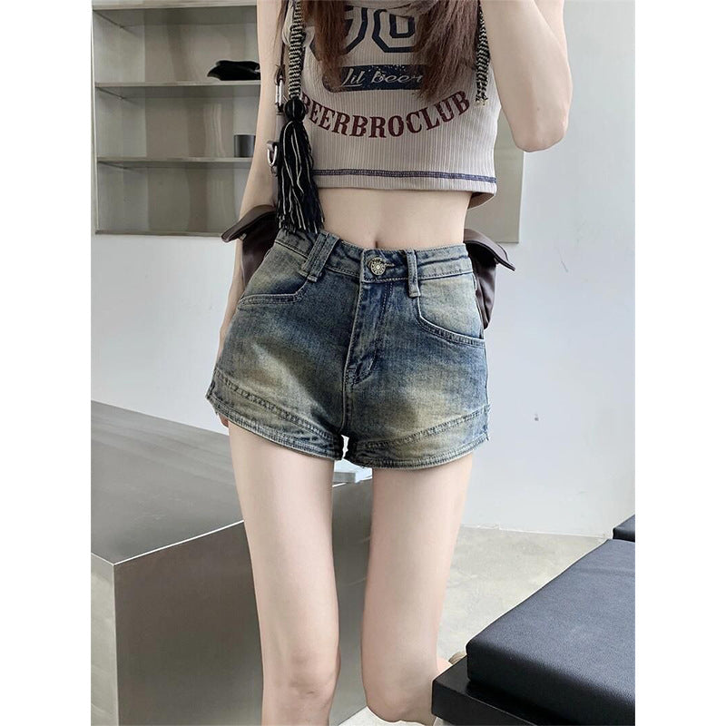 Kvinders højtaljede denim shorts med frynser
