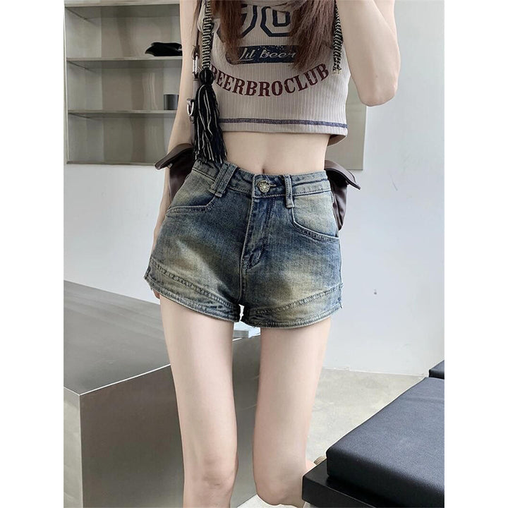 Kvinders højtaljede denim shorts med frynser