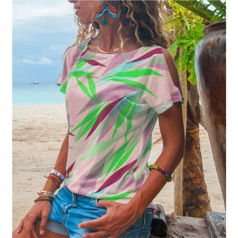 Kvinders T-shirt med asymmetrisk snit og farverigt bladmotiv Stilla