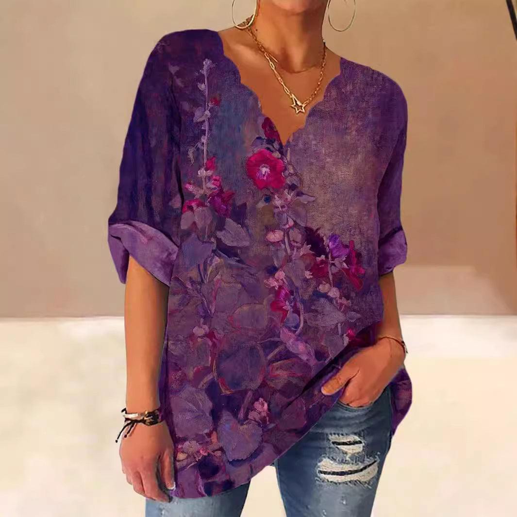 Dame V-hals bluse med kunstnerisk blomsterdesign og løs pasform Stilla